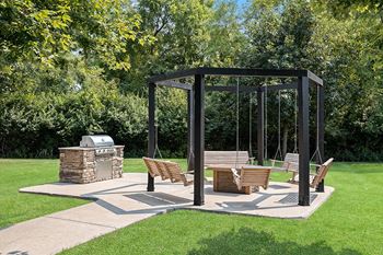Carrington Place at Shoal Creek - Courtyards with charcoal grills and benches